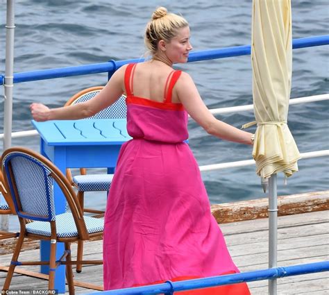 amber heard sexy|Amber Heard dons a tiny red bikini on a yacht in the Amalfi Coast